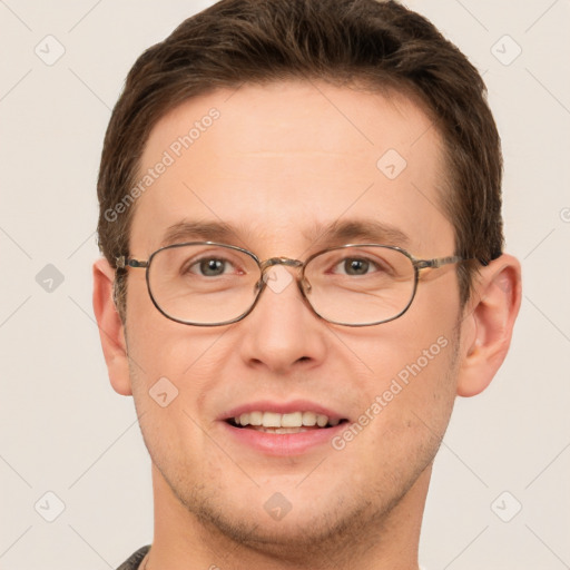 Joyful white adult male with short  brown hair and grey eyes