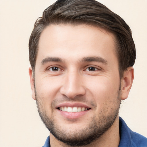 Joyful white young-adult male with short  brown hair and brown eyes