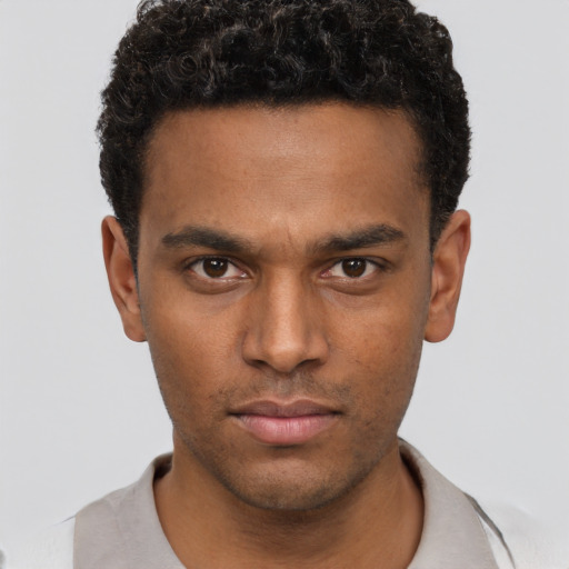 Neutral black young-adult male with short  brown hair and brown eyes