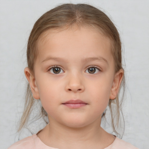 Neutral white child female with medium  brown hair and brown eyes