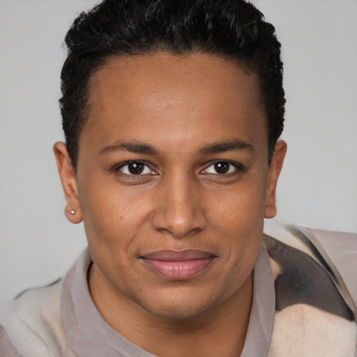 Joyful black young-adult male with short  brown hair and brown eyes