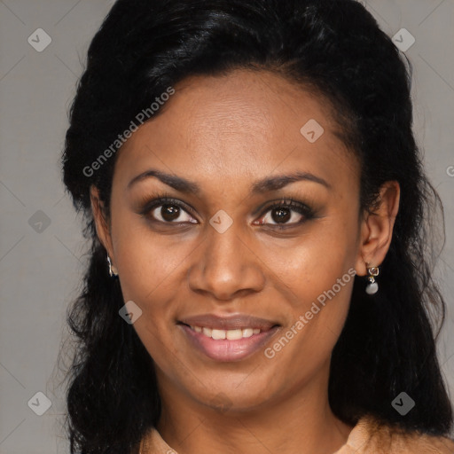 Joyful black adult female with long  black hair and brown eyes