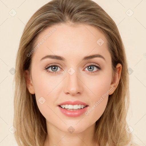 Joyful white young-adult female with long  brown hair and green eyes