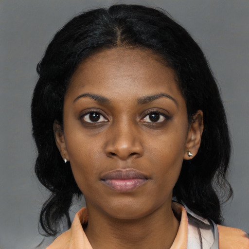 Neutral black young-adult female with medium  black hair and brown eyes