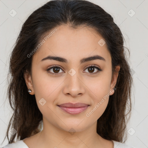 Joyful latino young-adult female with medium  brown hair and brown eyes