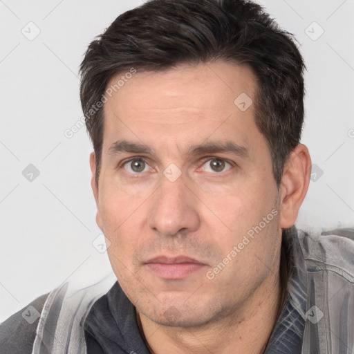 Neutral white adult male with short  brown hair and brown eyes