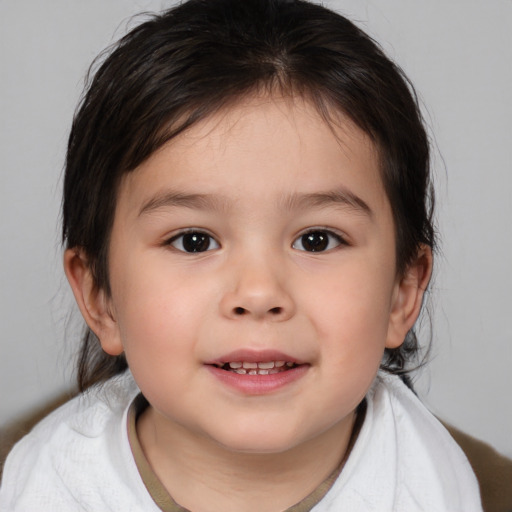 Joyful white child female with medium  brown hair and brown eyes