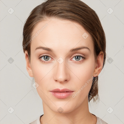 Neutral white young-adult female with medium  brown hair and green eyes