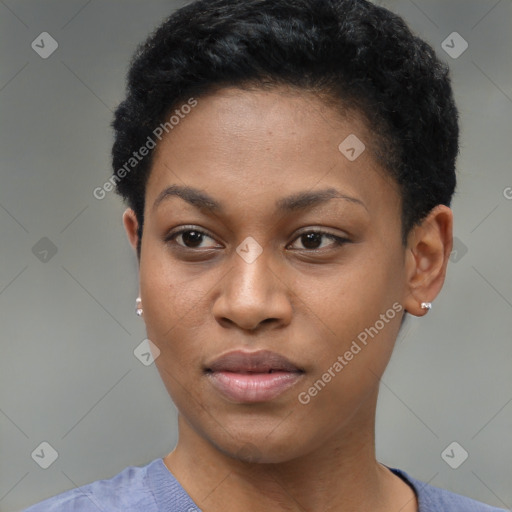 Joyful black young-adult female with short  black hair and brown eyes