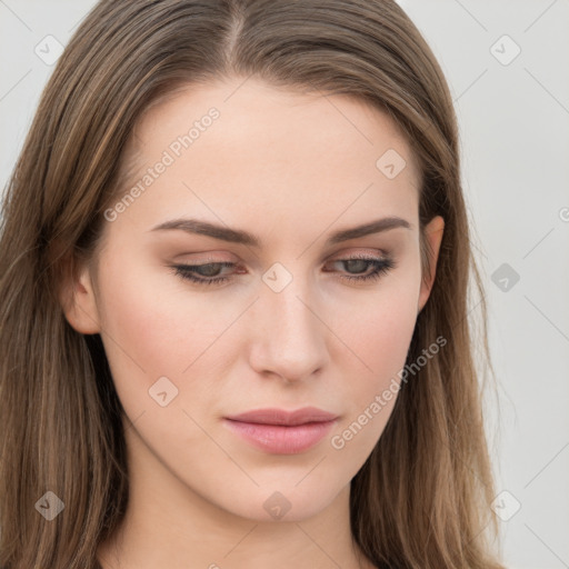 Neutral white young-adult female with long  brown hair and brown eyes