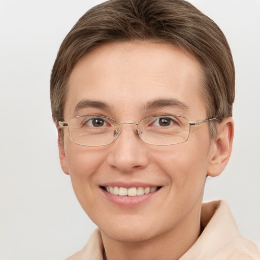 Joyful white adult female with short  brown hair and brown eyes