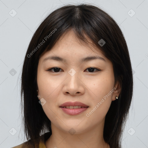 Joyful asian young-adult female with medium  brown hair and brown eyes