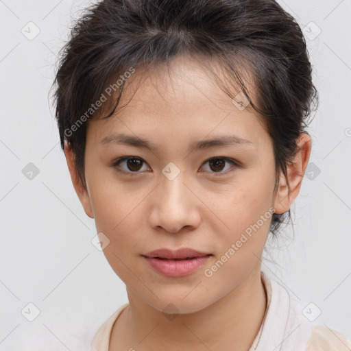 Joyful white child female with medium  brown hair and brown eyes