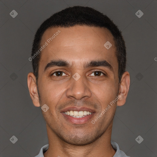 Joyful white young-adult male with short  black hair and brown eyes