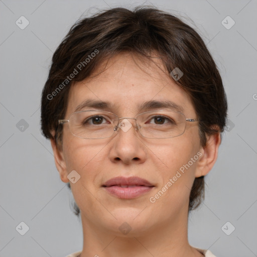 Joyful white adult female with short  brown hair and brown eyes