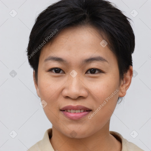 Joyful asian young-adult female with short  brown hair and brown eyes