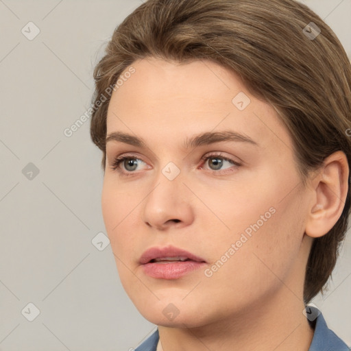 Neutral white young-adult female with short  brown hair and brown eyes