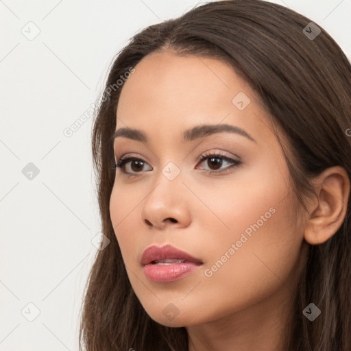 Neutral white young-adult female with long  brown hair and brown eyes