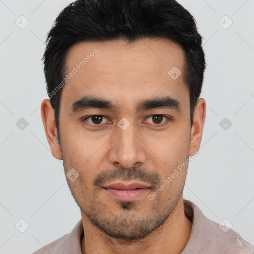Joyful asian young-adult male with short  black hair and brown eyes