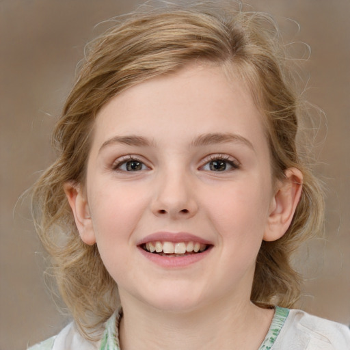 Joyful white child female with medium  brown hair and grey eyes