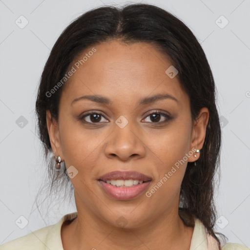 Joyful latino young-adult female with medium  brown hair and brown eyes