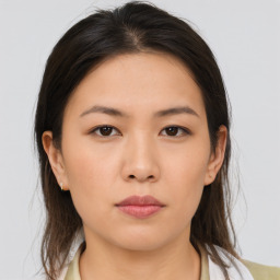 Neutral asian young-adult female with medium  brown hair and brown eyes