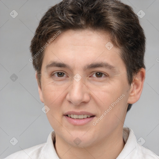 Joyful white adult female with short  brown hair and brown eyes