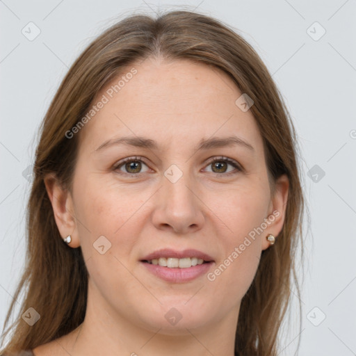 Joyful white adult female with medium  brown hair and grey eyes