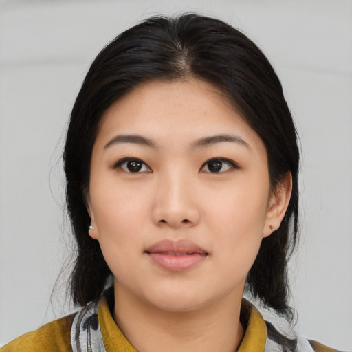 Neutral asian young-adult female with medium  black hair and brown eyes