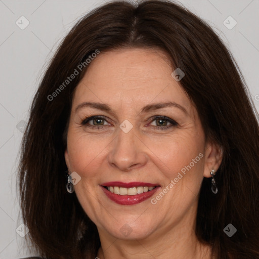 Joyful white adult female with long  brown hair and brown eyes