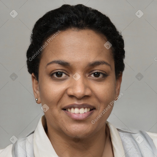 Joyful black young-adult female with short  black hair and brown eyes