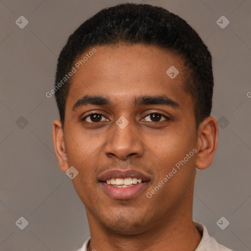 Joyful black young-adult male with short  brown hair and brown eyes