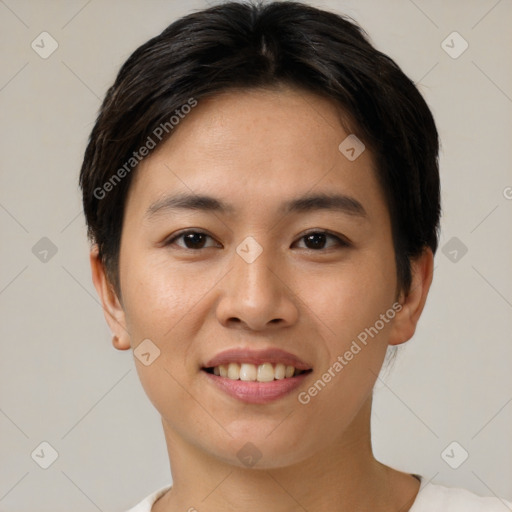 Joyful asian young-adult female with short  brown hair and brown eyes