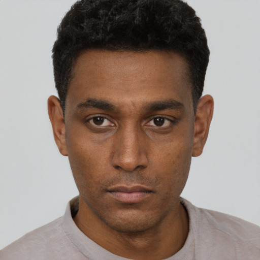 Neutral black young-adult male with short  black hair and brown eyes