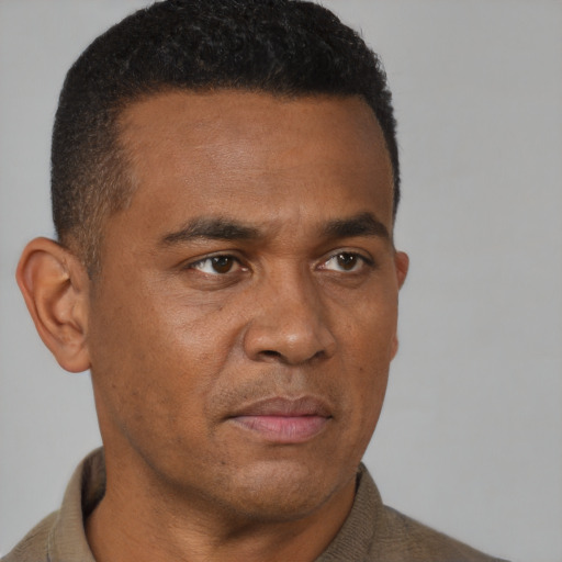 Neutral black adult male with short  brown hair and brown eyes