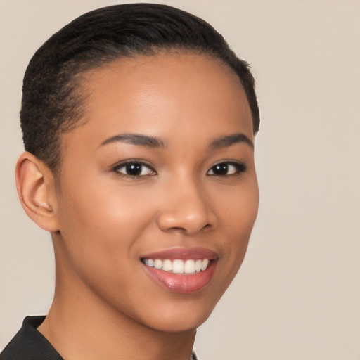 Joyful latino young-adult female with short  brown hair and brown eyes