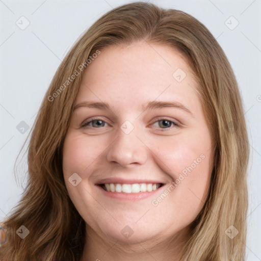 Joyful white young-adult female with long  brown hair and blue eyes