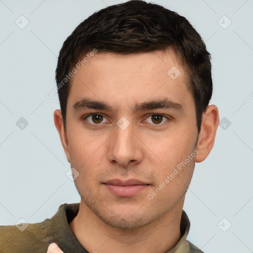 Neutral white young-adult male with short  brown hair and brown eyes