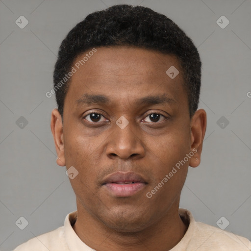 Neutral black young-adult male with short  brown hair and brown eyes