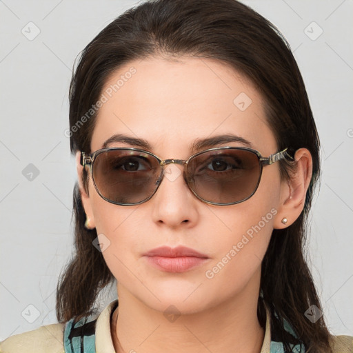 Neutral white young-adult female with medium  brown hair and brown eyes