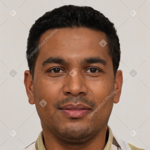 Neutral latino young-adult male with short  black hair and brown eyes