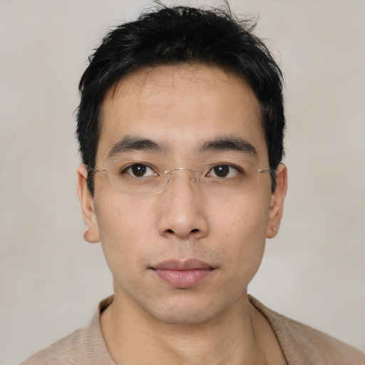 Neutral asian young-adult male with short  black hair and brown eyes