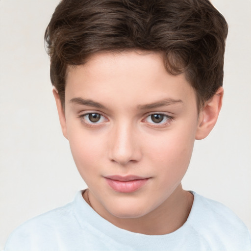 Joyful white child female with short  brown hair and brown eyes