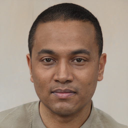 Neutral black young-adult male with short  black hair and brown eyes