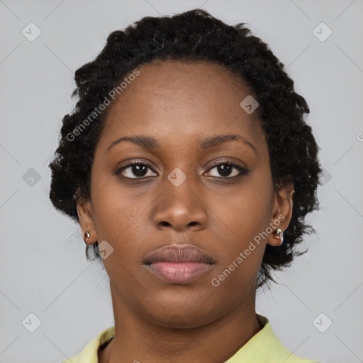 Neutral black young-adult female with short  brown hair and brown eyes