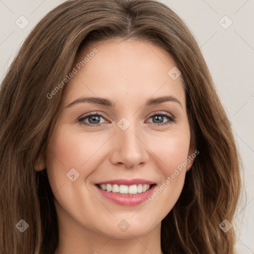 Joyful white young-adult female with long  brown hair and green eyes