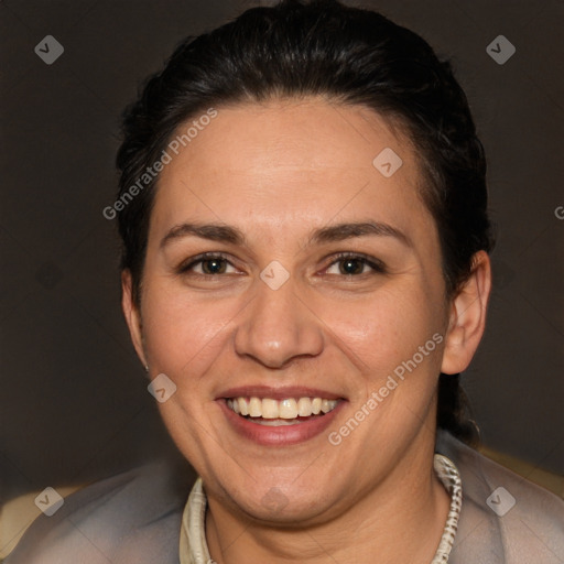 Joyful white adult female with short  brown hair and brown eyes