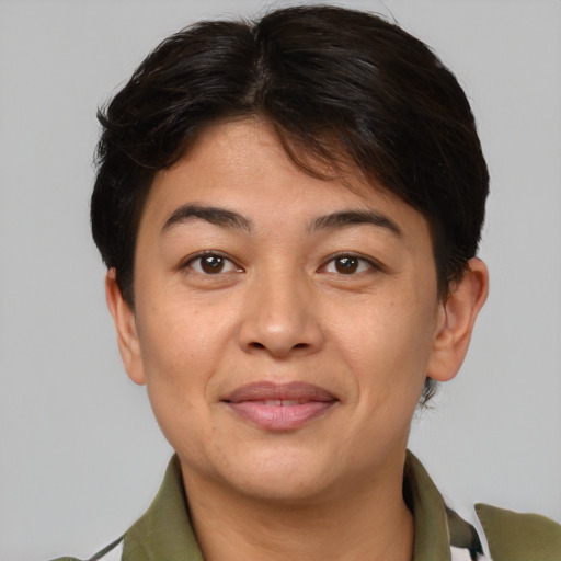 Joyful asian young-adult female with short  brown hair and brown eyes