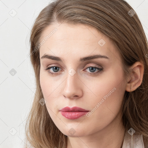 Neutral white young-adult female with long  brown hair and grey eyes