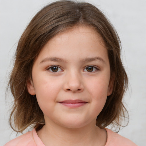 Joyful white child female with medium  brown hair and grey eyes